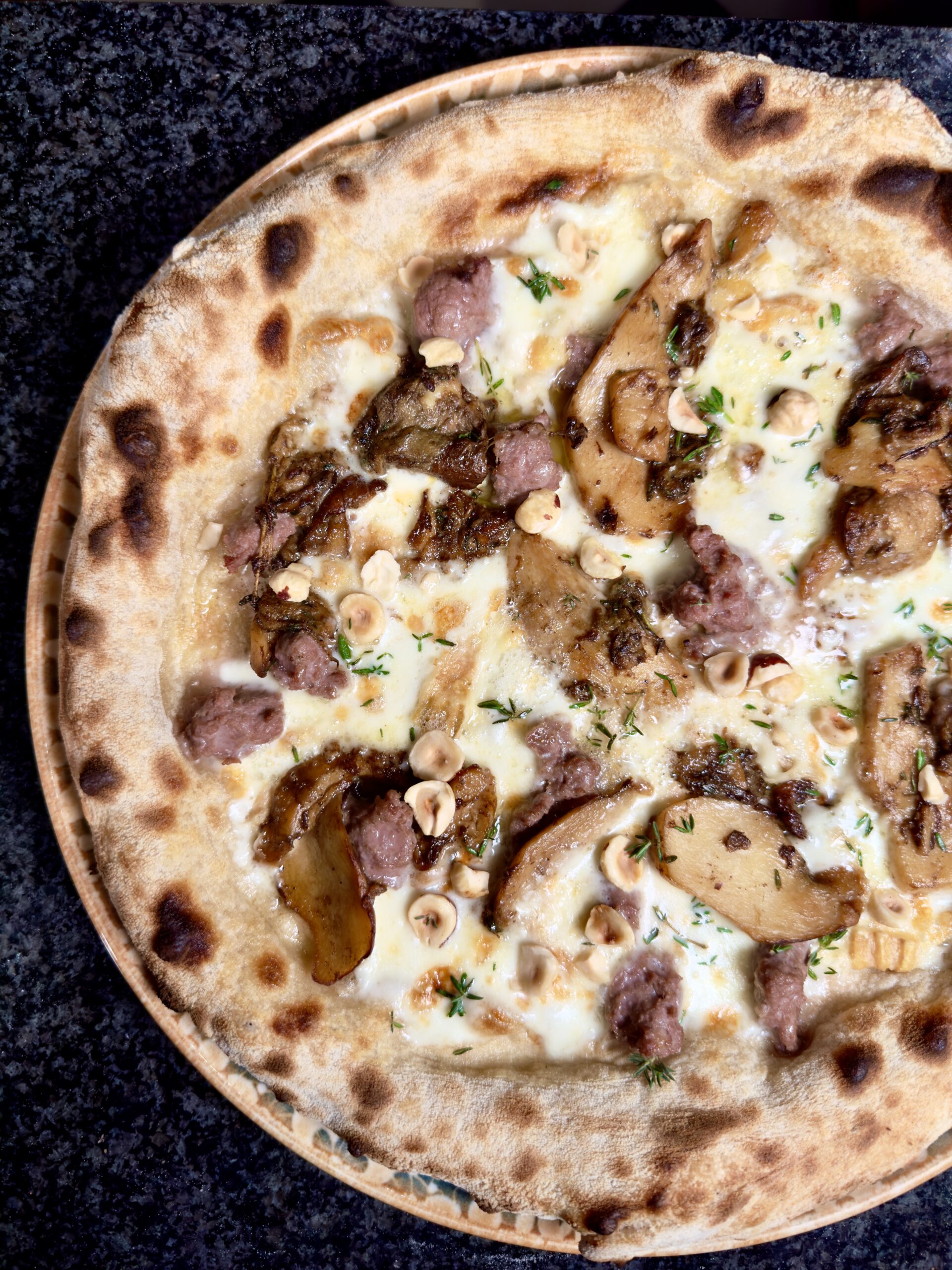 In cottura: Funghi Porcini freschi di Borgotaro trifolati,  Formaggio Vaca Straca 